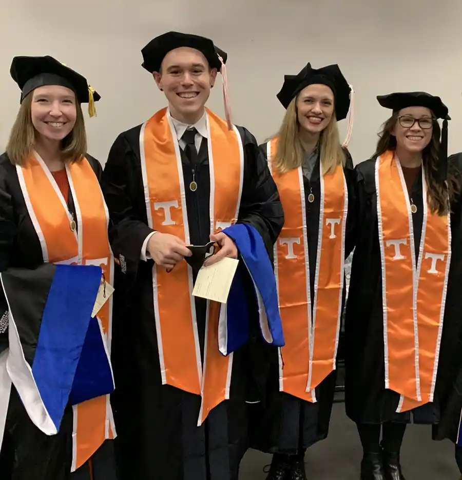 Anthropology PhD graduates, Spring 2023, in their caps, gowns, and stolls
